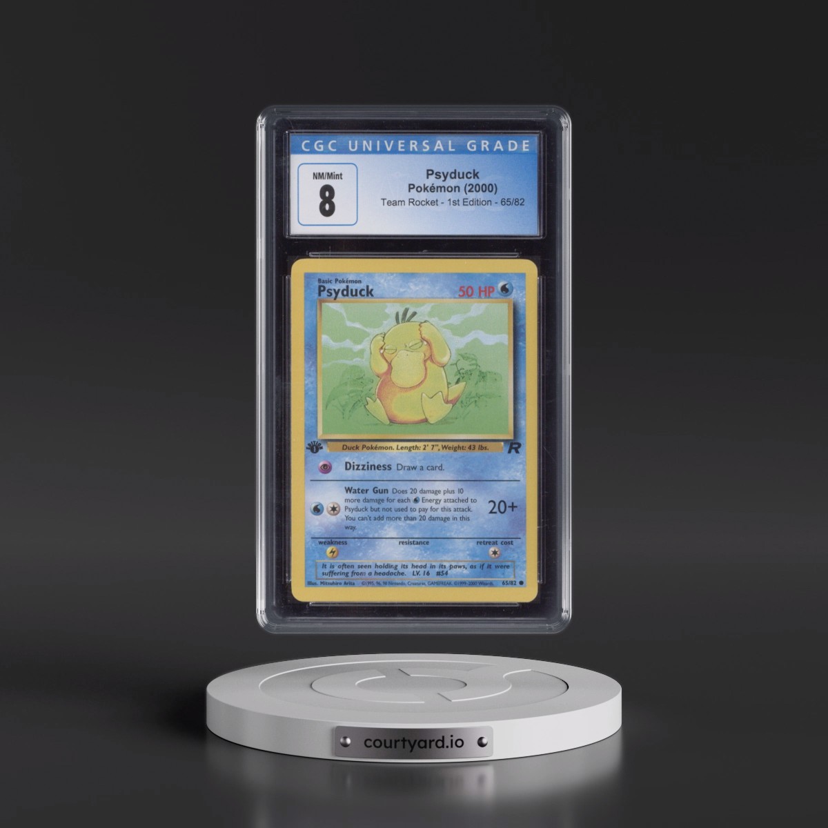 2000 Team Rocket #65/82 Psyduck - 1st Edition 1st Edition (CGC 8 NM-MT)