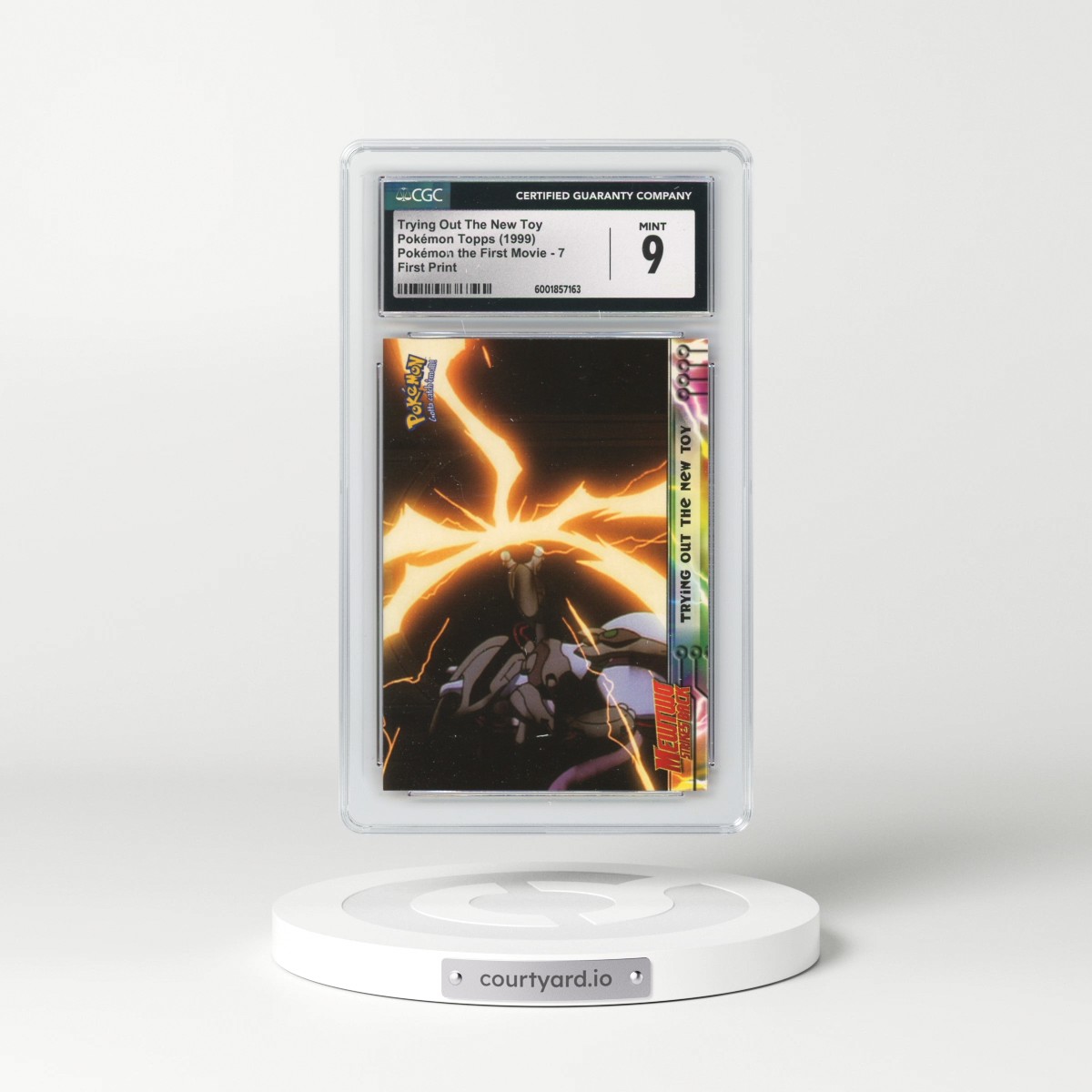 1999 Pokémon the First Movie #7 Trying Out The New Toy - First Print (Blue Topps Logo) (CGC 9 MINT)