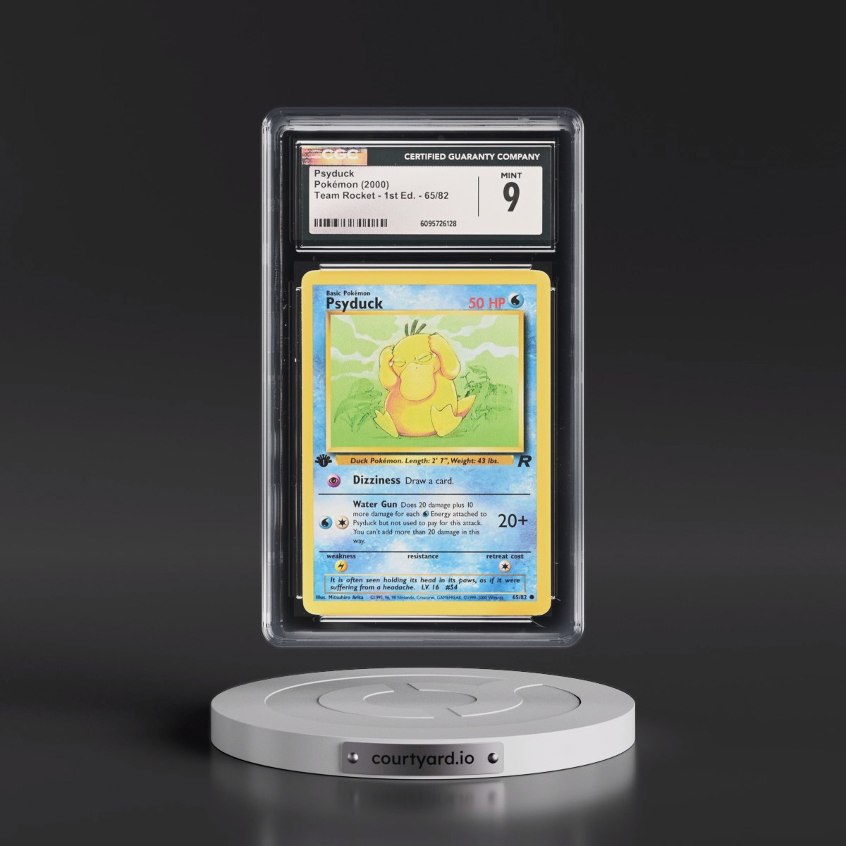 2000 Team Rocket #65/82 Psyduck - 1st Edition 1st Edition (CGC 9 MINT)