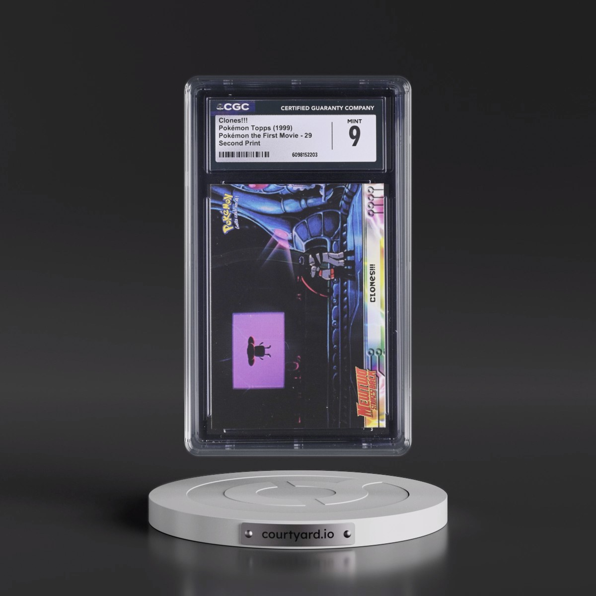 1999 Pokémon the First Movie #29 Clones!!! - Second Print (Black Topps Logo) (CGC 9 MINT)