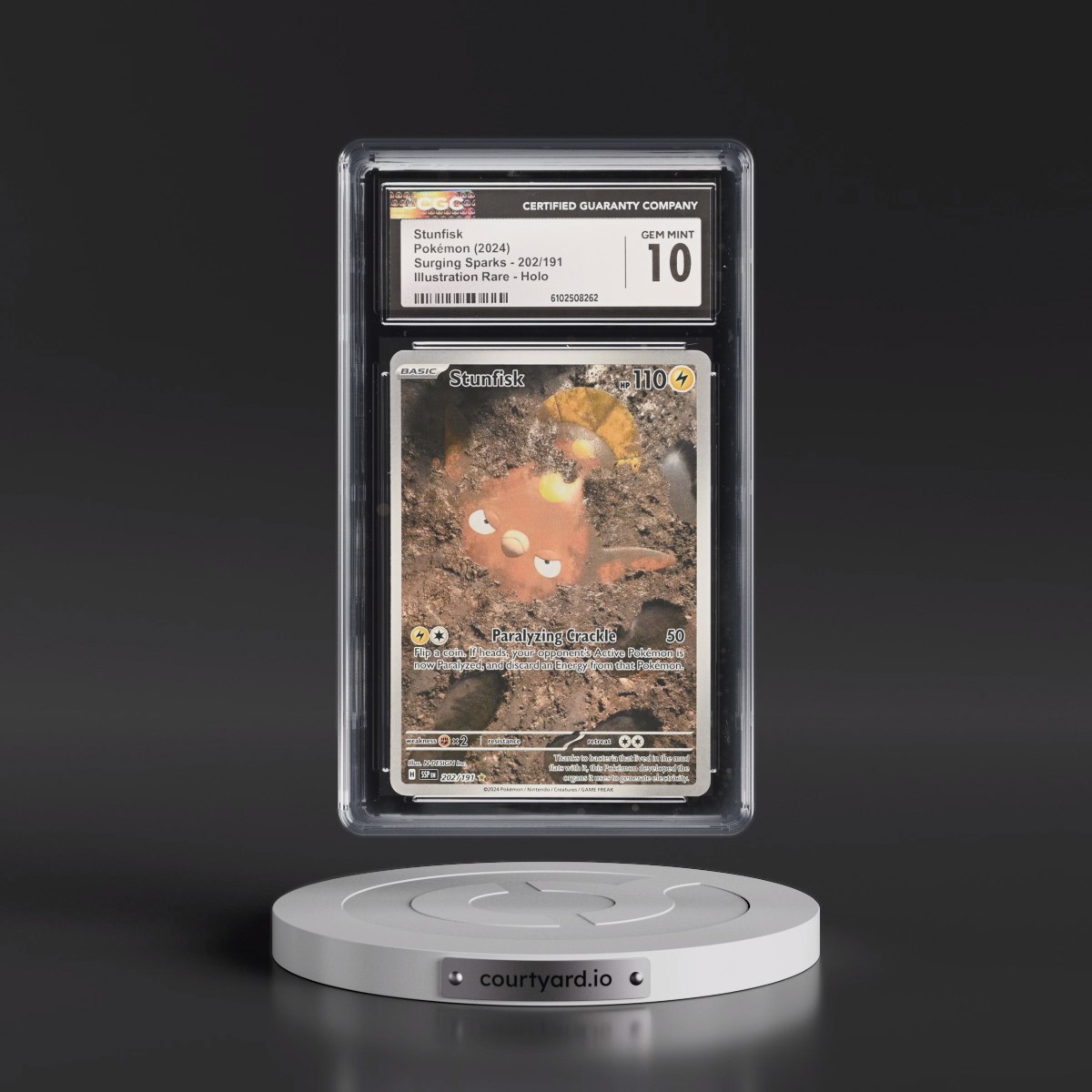 2024 Pokémon Ssp EN-Surging Sparks #202 Stunfisk - Illustration Rare (CGC 10 GEM MINT)