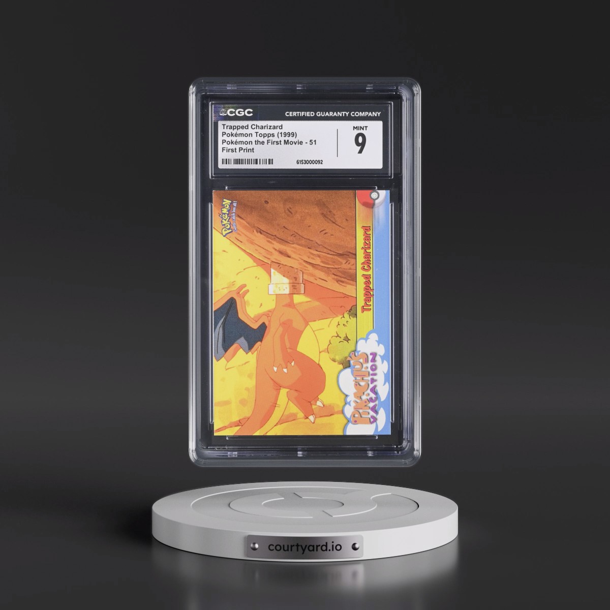 1999 Pokémon the First Movie #51 Trapped Charizard - First Print (Blue Topps Logo) (CGC 9 MINT)