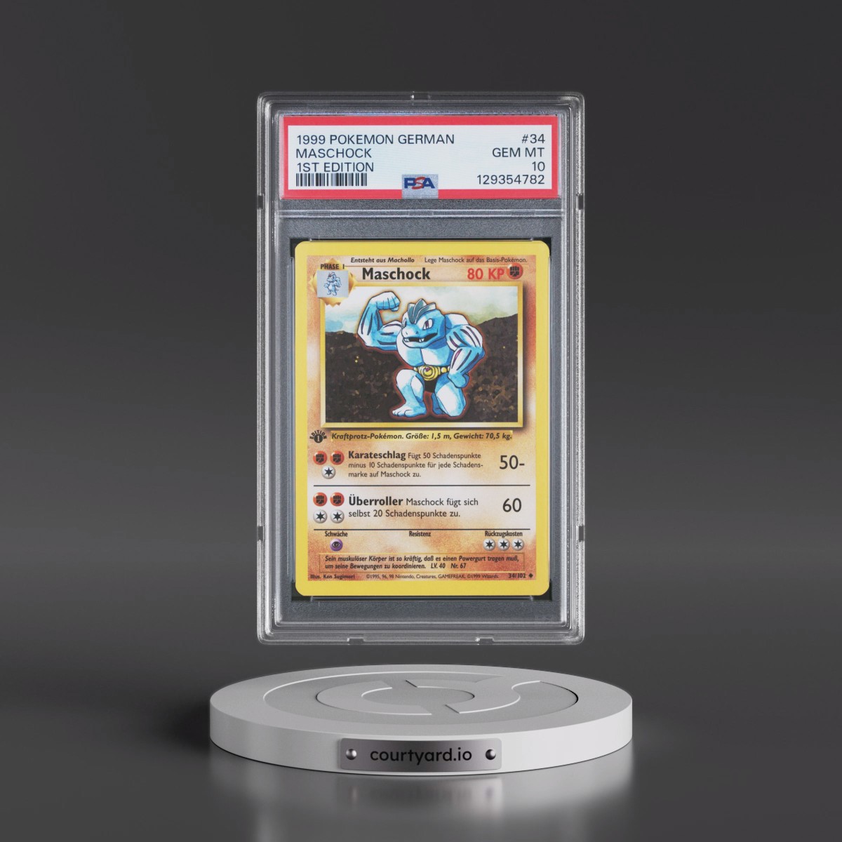1999 Pokémon #34 Maschock - 1st Edition (PSA 10 GEM MINT)