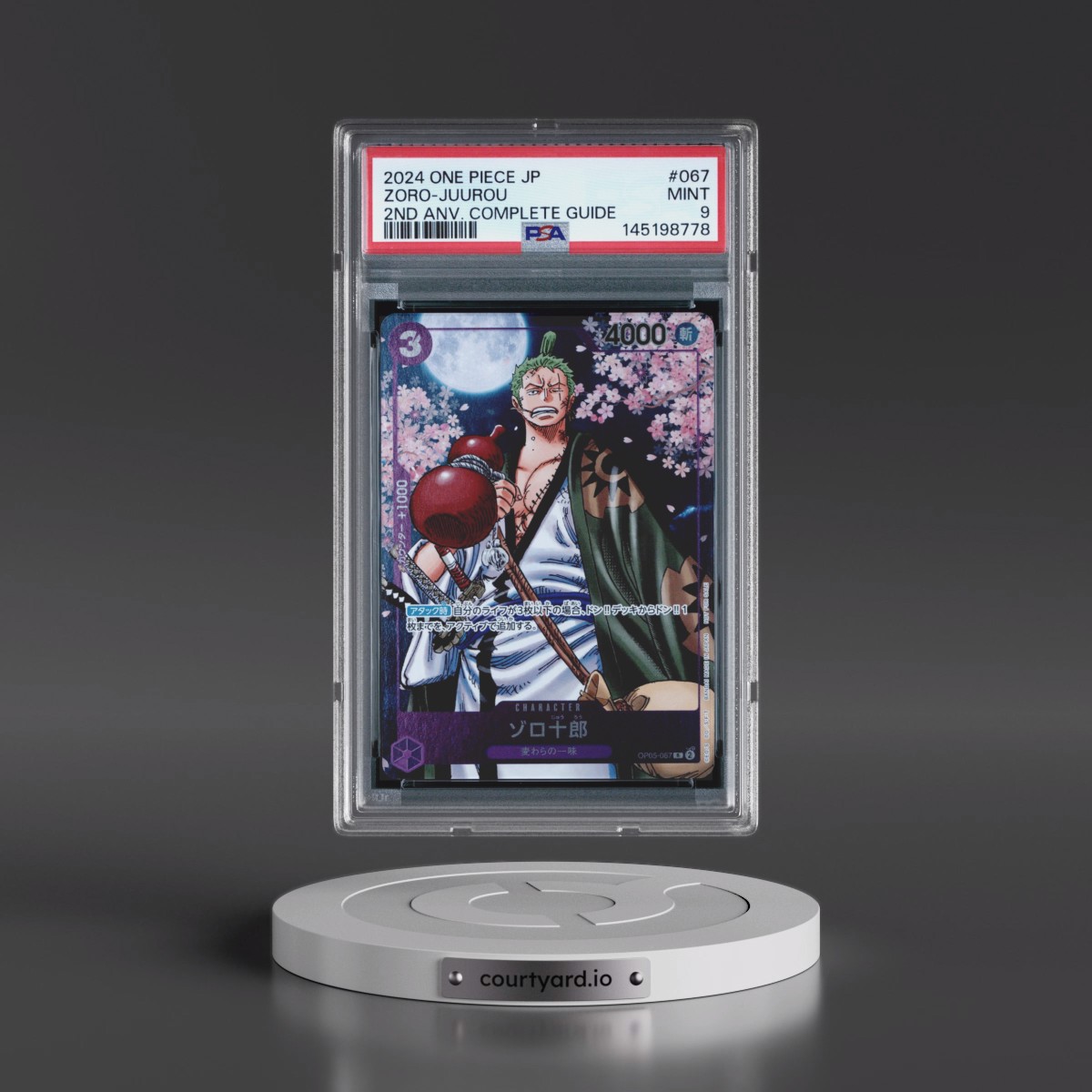 2024 One Piece Japanese Promos #067 Zoro-Juurou - One Piece Card Game 2nd Anniversary Complete Guide (PSA 9 MINT)