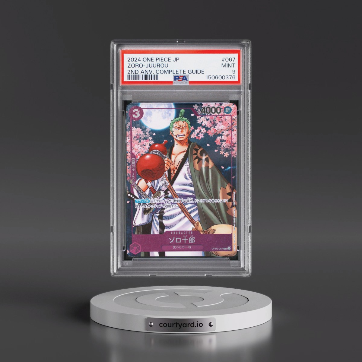 2024 One Piece Japanese Promos #067 Zoro-Juurou - One Piece Card Game 2nd Anniversary Complete Guide (PSA 9 MINT)