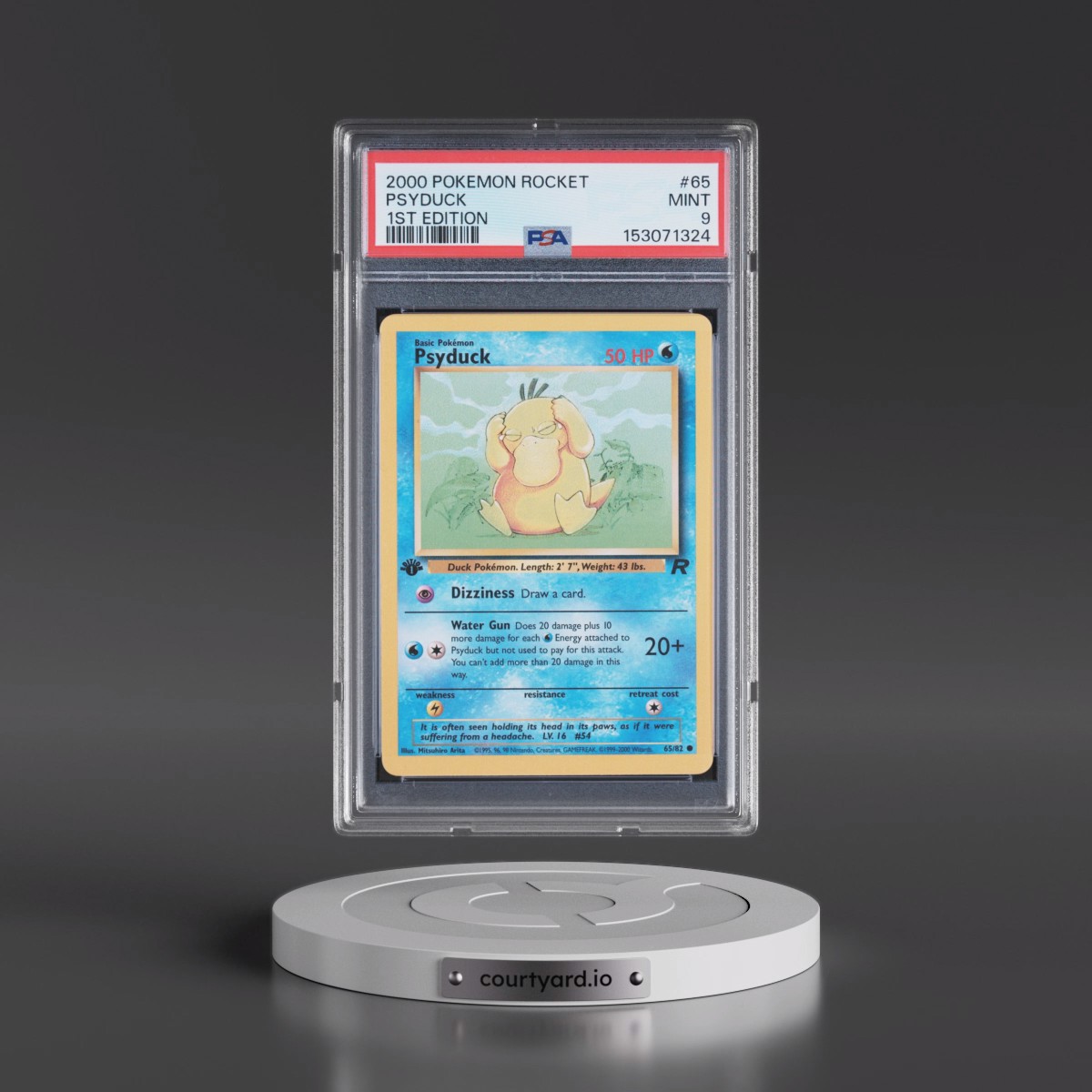 2000 Pokémon Rocket #65 Psyduck - 1st Edition (PSA 9 MINT)