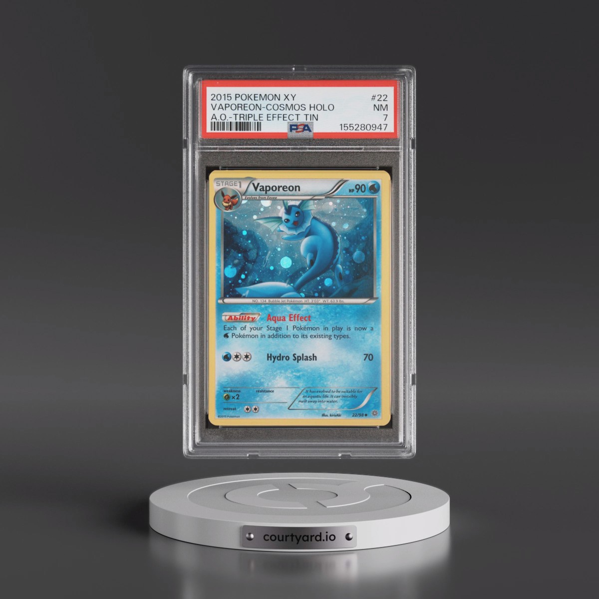 2015 Pokémon XY Ancient Origins #22 Vaporeon - Holo Cosmos-Triple Effect Tin (PSA 7 NM)