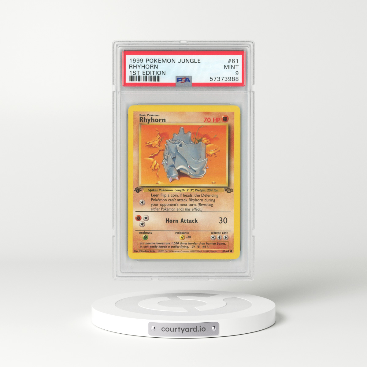 1999 Jungle #61 Rhyhorn - 1st Edition (PSA 9 MINT)