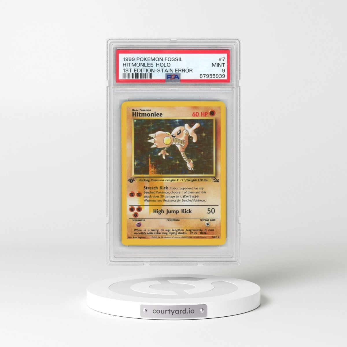 1999 Pokémon Fossil #7 Hitmonlee - 1st Edition Holo Stain Error (PSA 9 MINT)